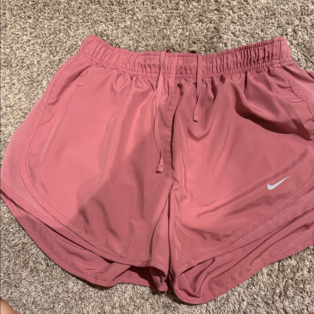 Nike Women's Rose Pink Athletic Shorts with White Swoosh